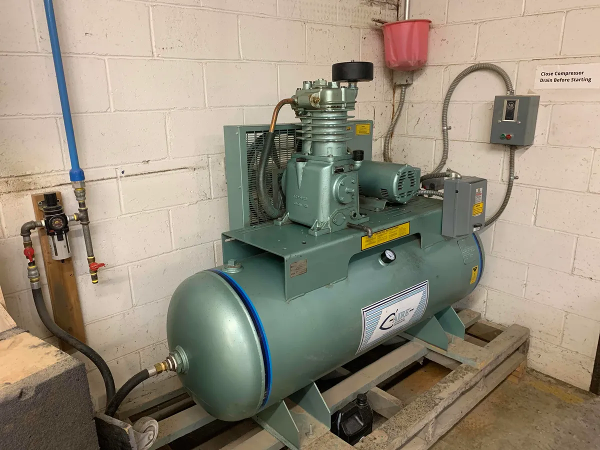 2008 C-Aire 5 HP 80 Gal Horizontal Air Compressor installed at Slamhammer Audio & Cases